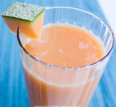 drink-cantaloupe-ginger-juicing