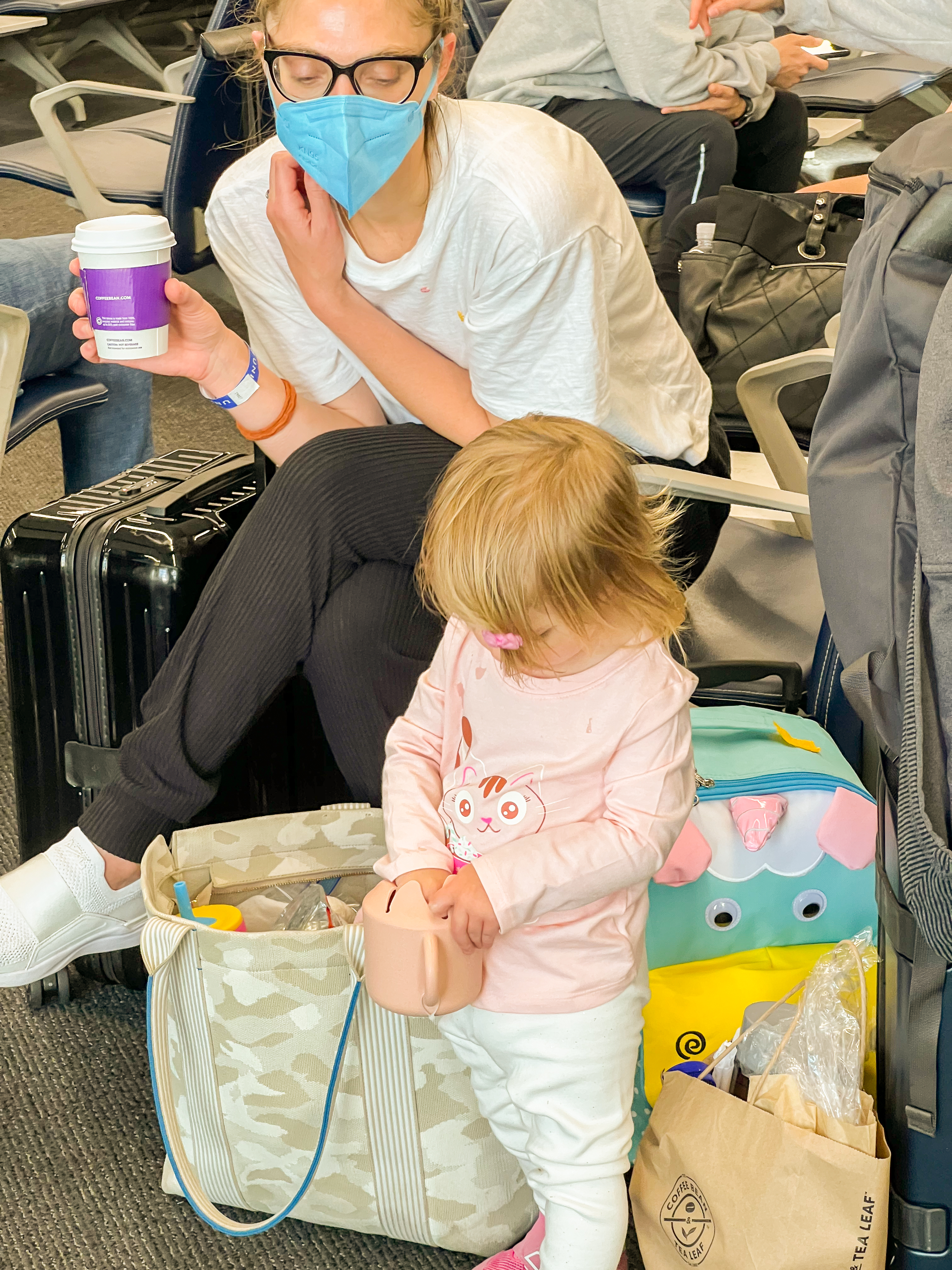 at the airport, waiting to board