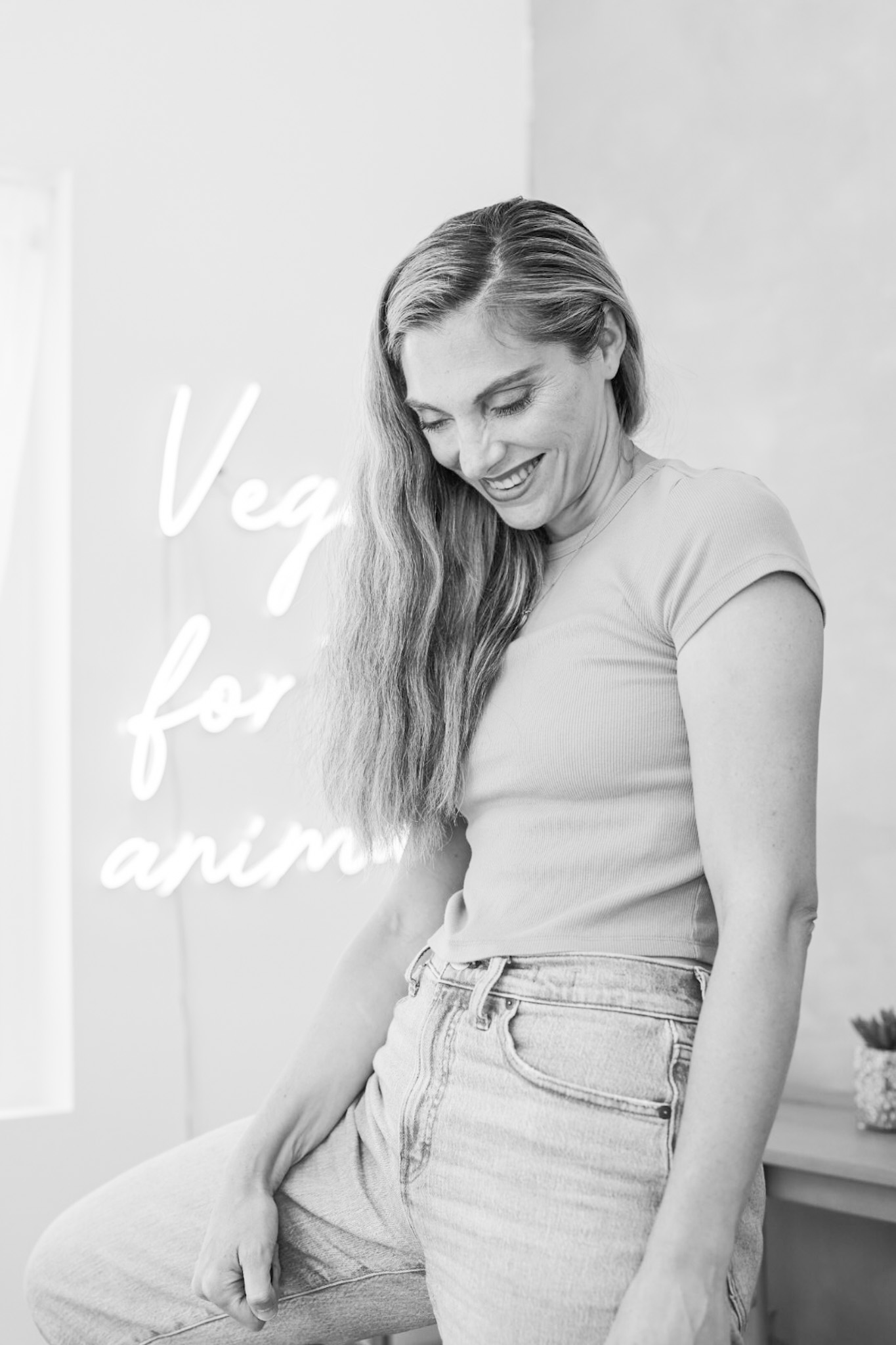 kathy patalsky 2024 in studio vegan for the animals sign in background