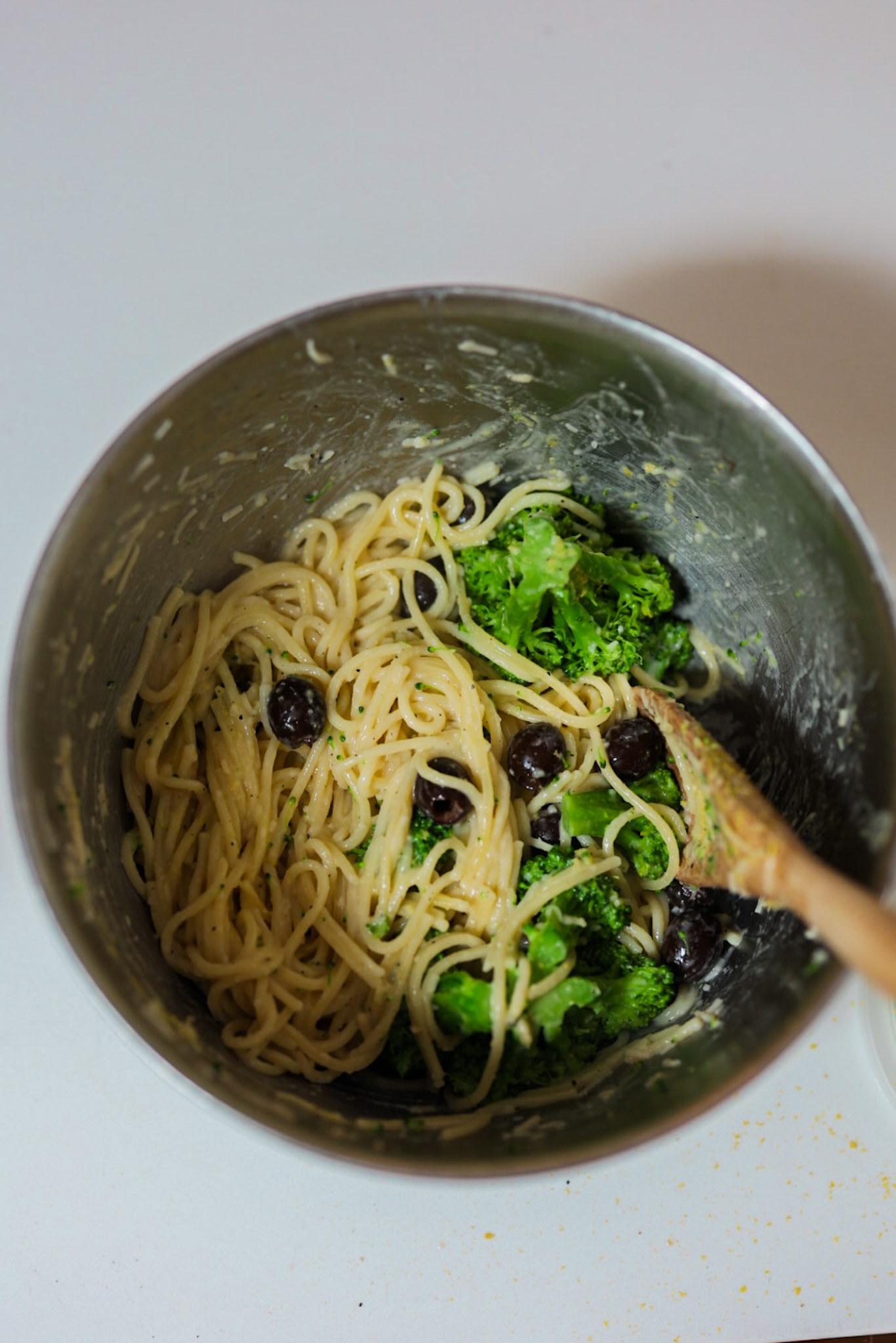 cacio e pepe vegan pasta mixing bowl with spoon