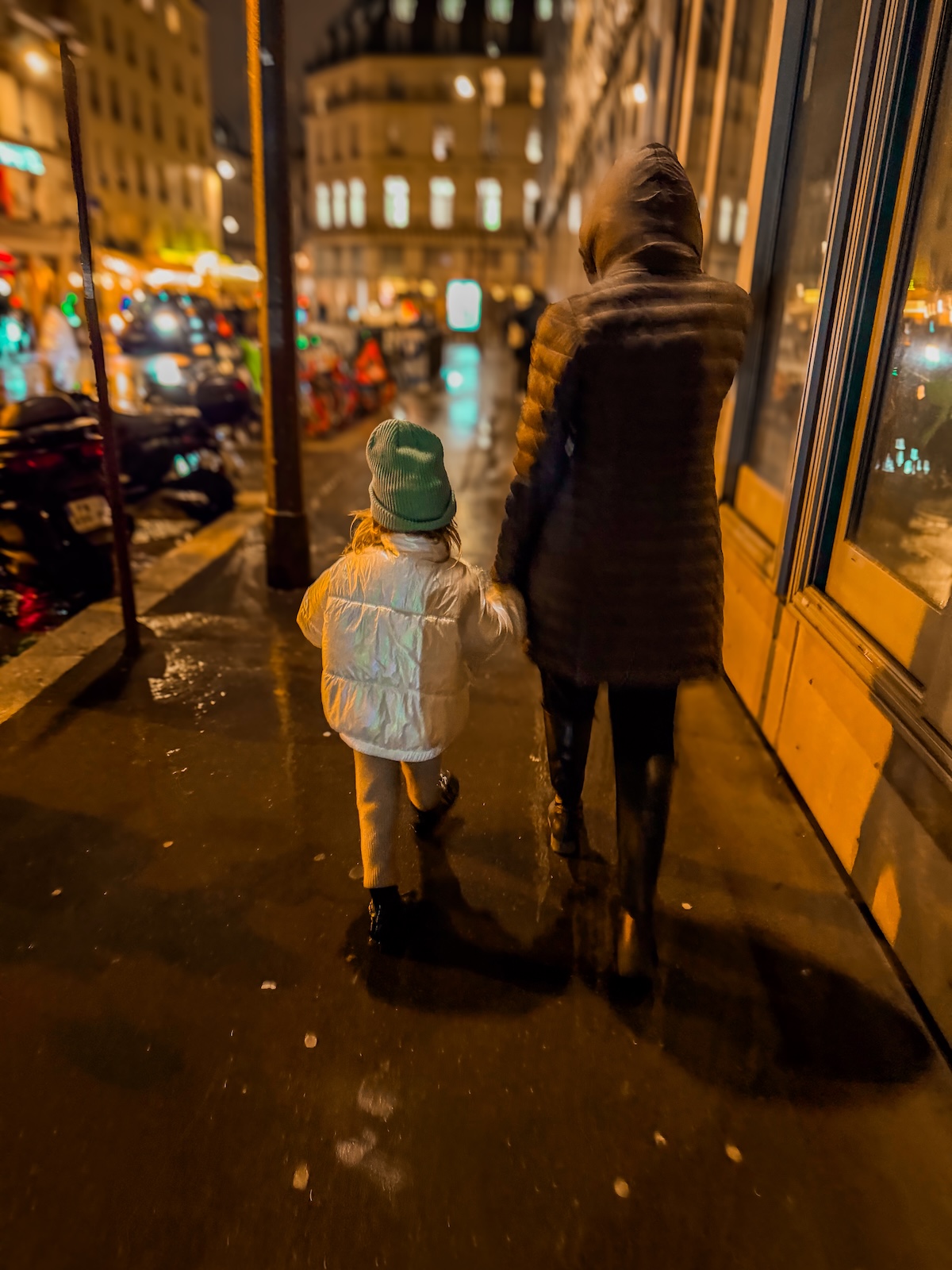 mom and me walking in rain in Paris